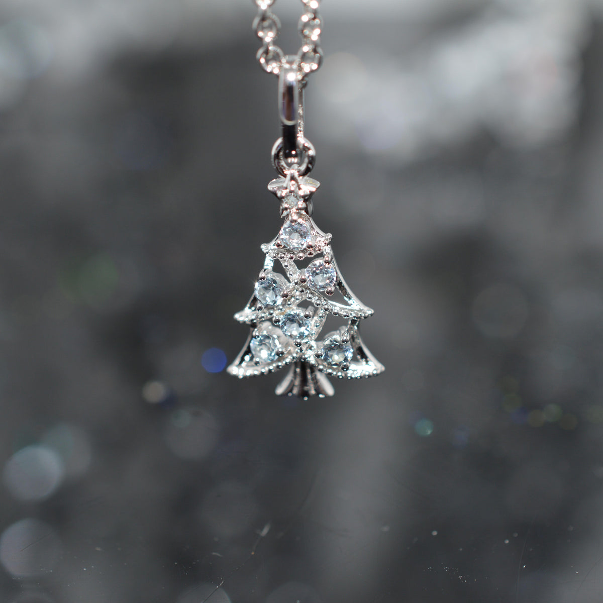 Sterling Silver Chain With Christmas Tree Pendant Set With Topaz Gemstones