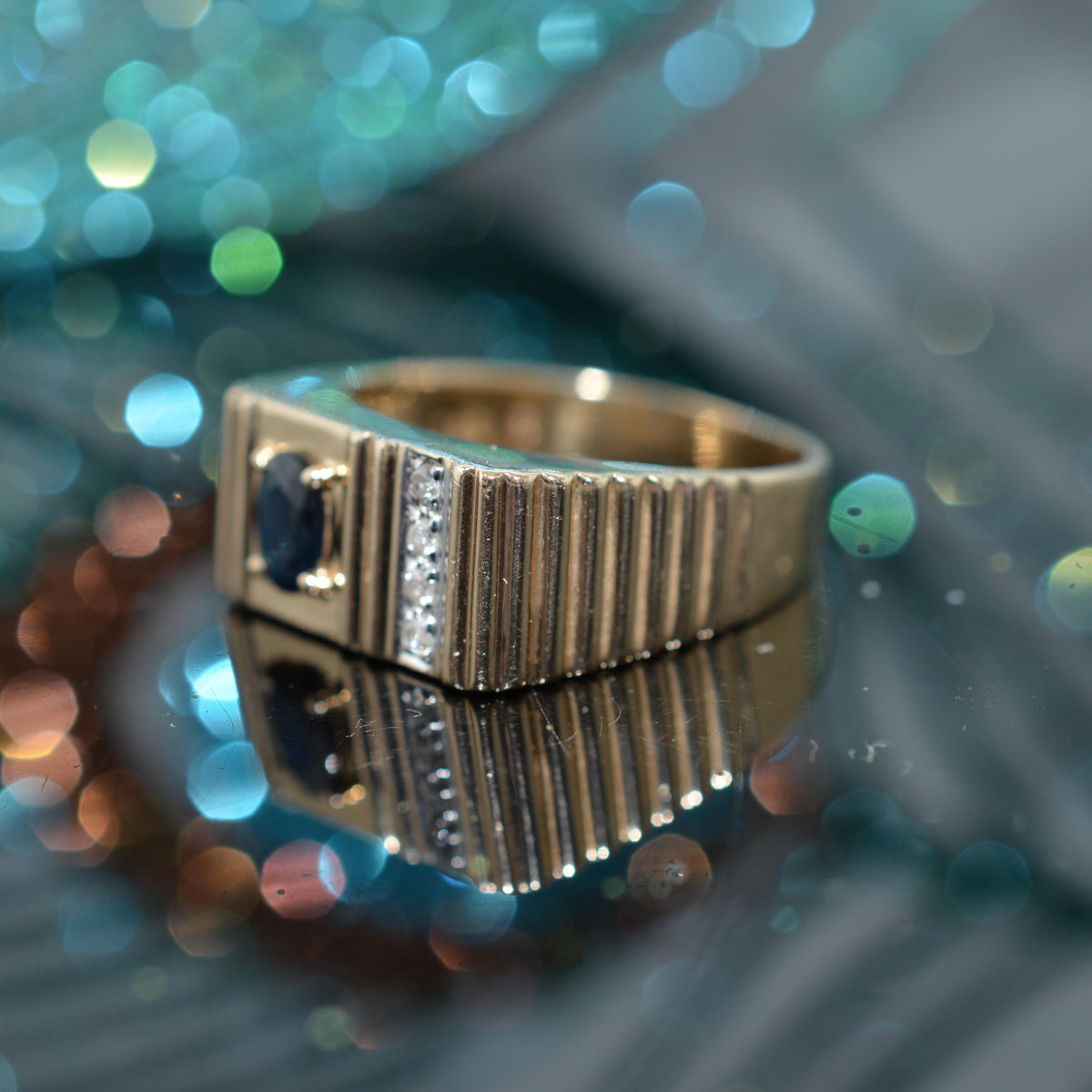 Gents 14K Yellow Gold Oval Sapphire & Diamond Ribbed Ring