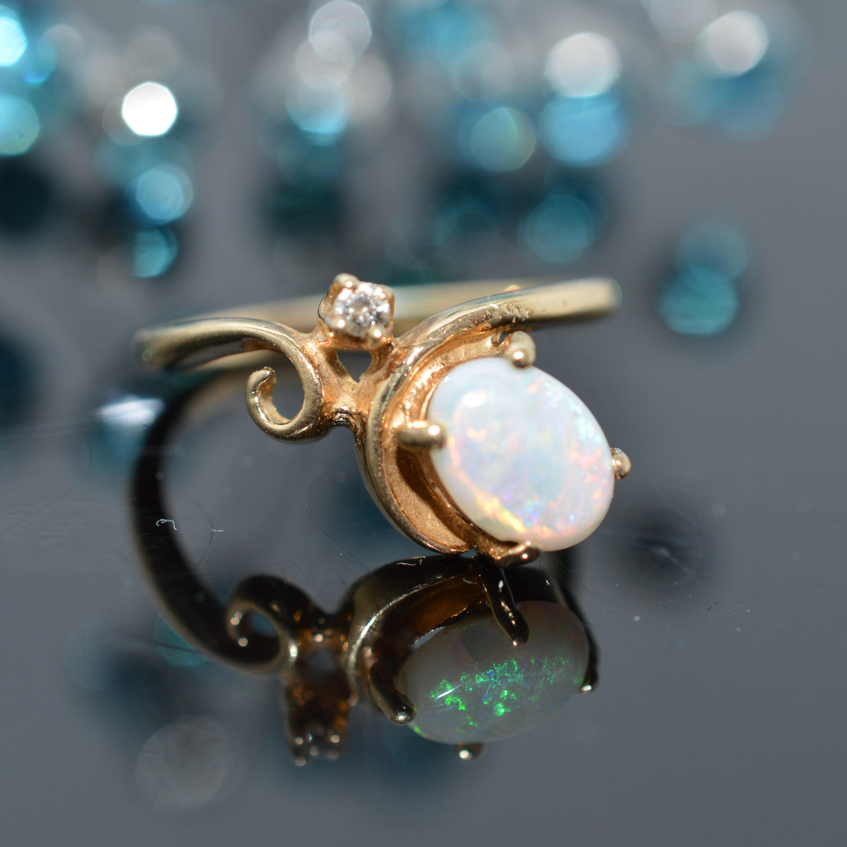 14K Yellow Gold Oval Opal Ring With Old Mine Cut Diamond
