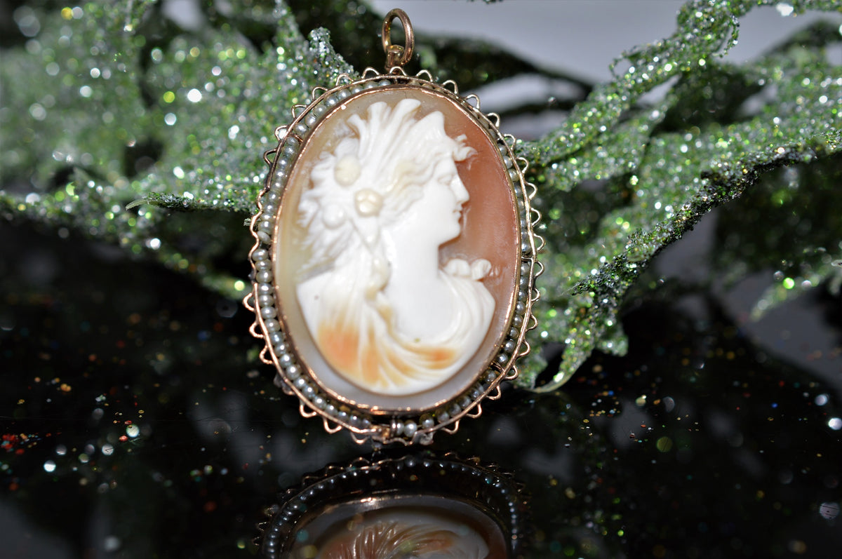 10K Oval Shell Cameo With A Strung Seed Pearl Border