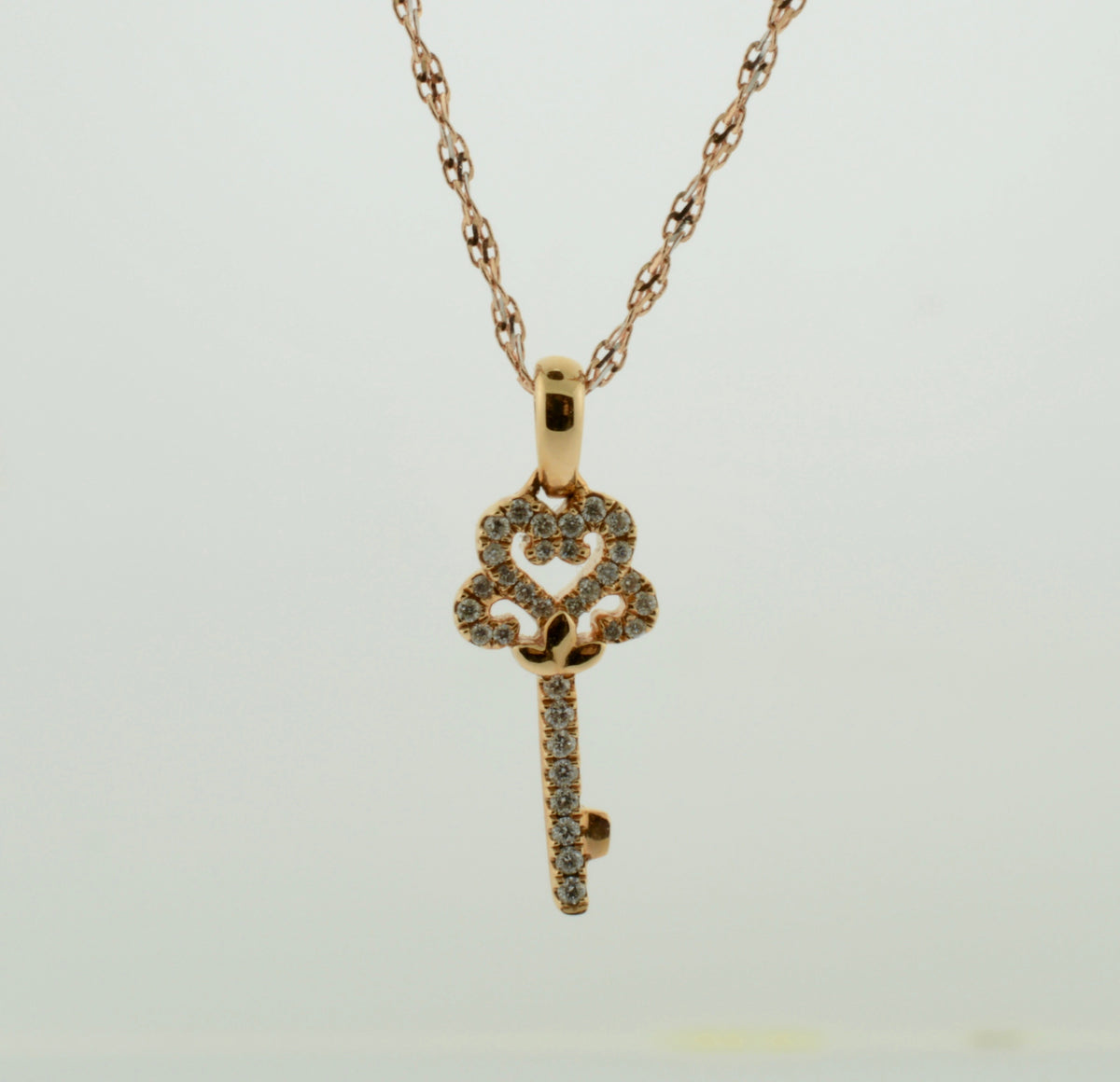 18K Rose Gold Diamond Key 18 inch Necklace (0.09ctw)