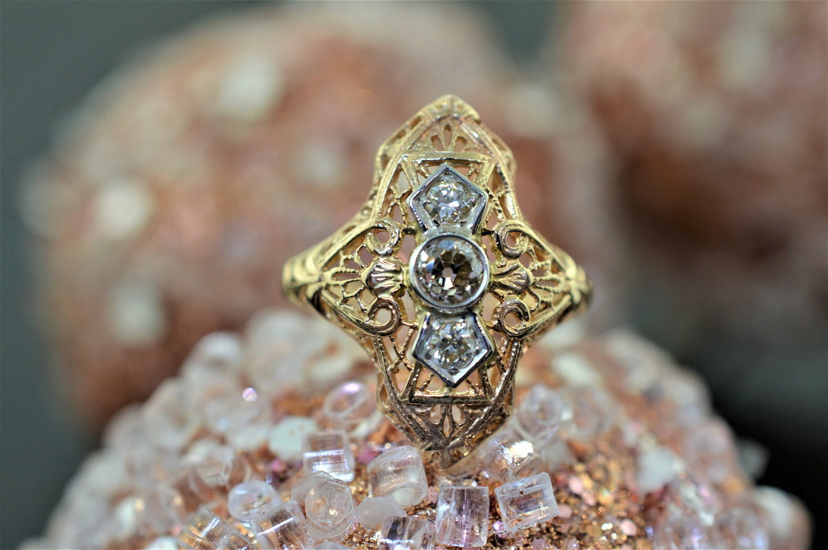A Ladies 14 Karat Rose Gold, Filigree Diamond Ring