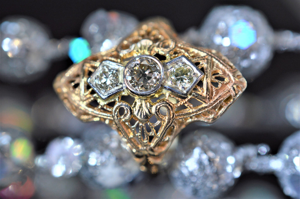 A Ladies 14 Karat Rose Gold, Filigree Diamond Ring