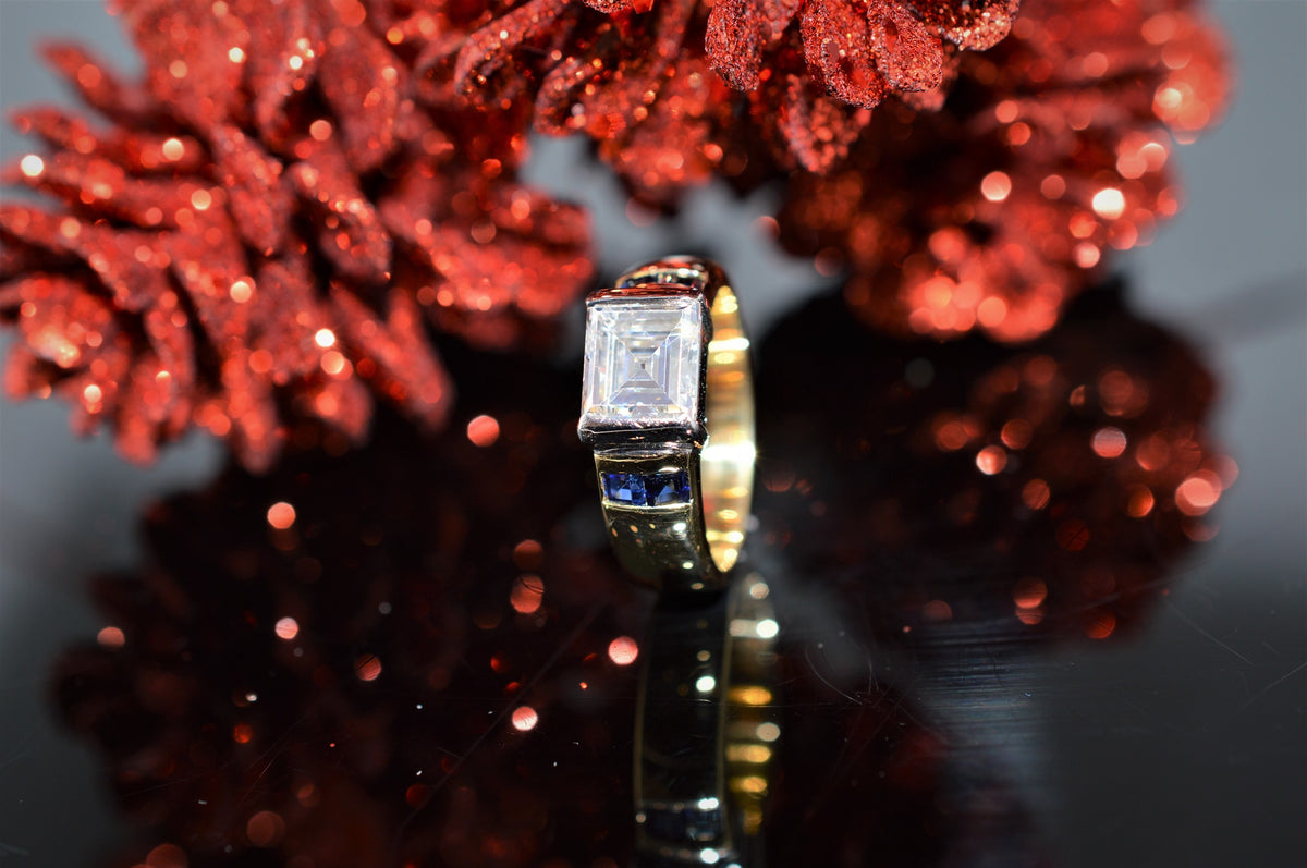 18K Platinum Sapphire And Rectangular Step Cut Diamond Ring