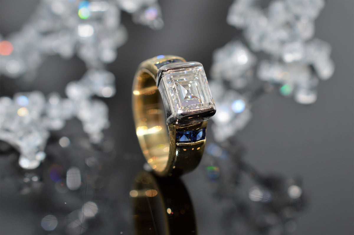 18K Platinum Sapphire And Rectangular Step Cut Diamond Ring