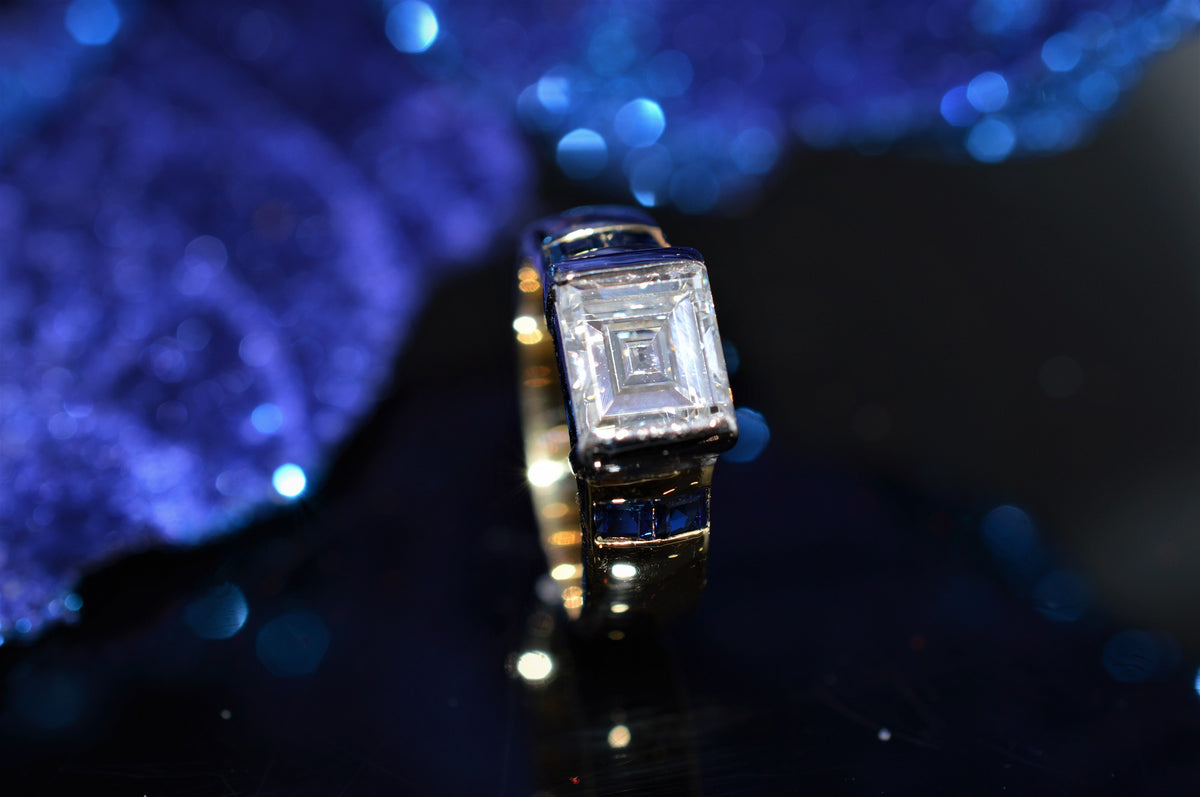 18K Platinum Sapphire And Rectangular Step Cut Diamond Ring
