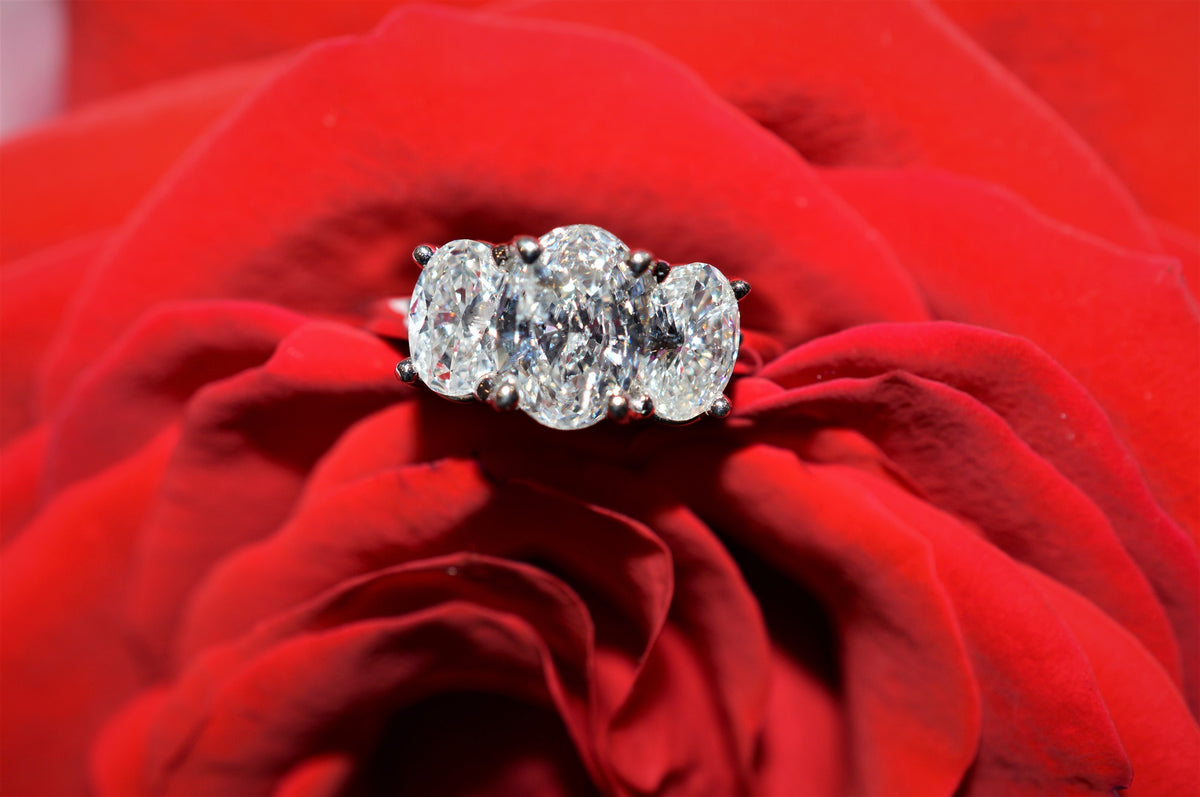 14 Karat White Gold, Three Stone Oval Diamond Ring